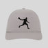 Gray cap with a black silhouette of a person playing badminton on a light gray background